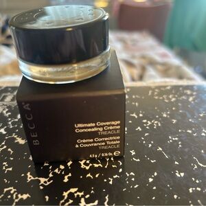 BECCA Concealing Crème - Treacle (Deep Brown)